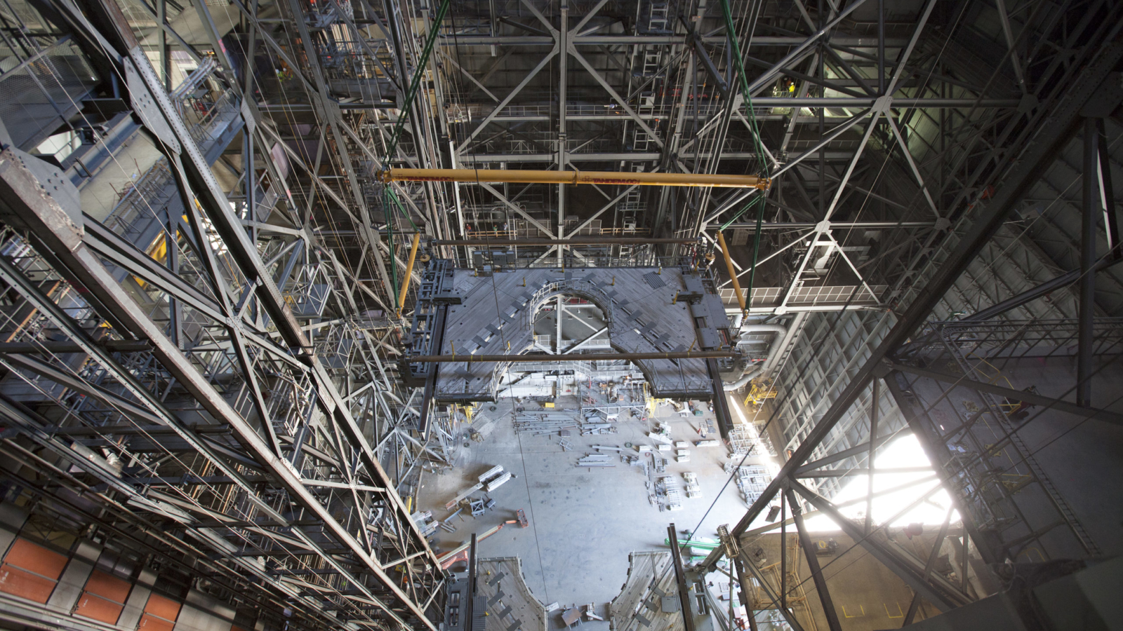 Photos of Platform K(2) being lifted and installed into Highbay 3 inside the VAB.